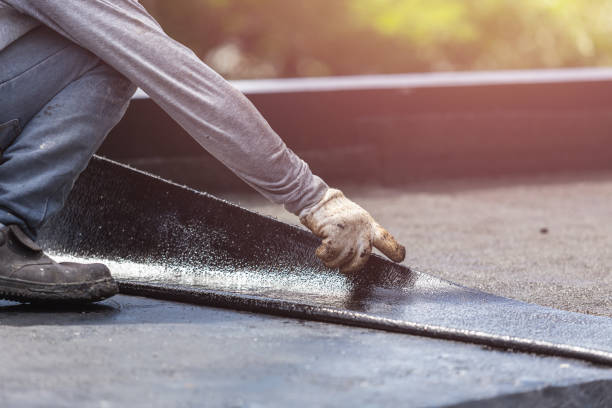 Professional Basement Waterproofing technician working in Baden, MD